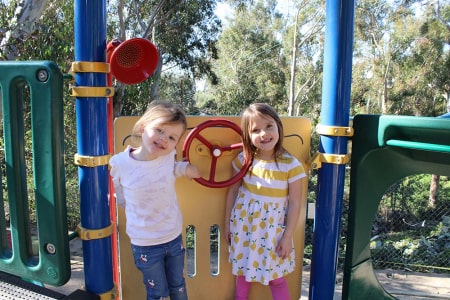 Childrens on the playground PreSchool Fleur De Lis San Diego Children's Bike Ride