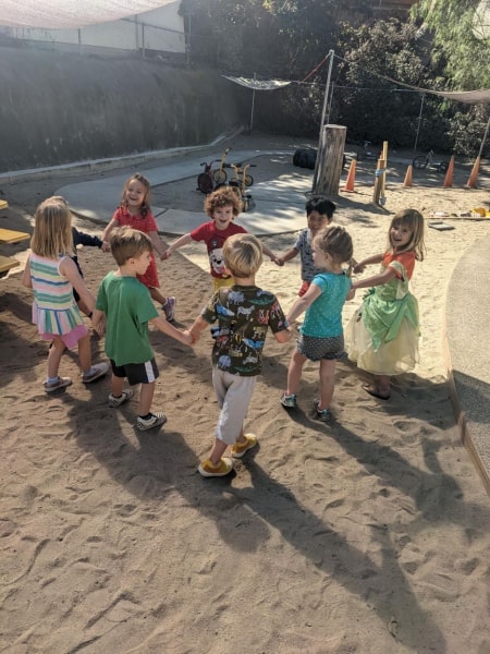 Сhild's play in the yard in PreSchool Fleur De Lis San Diego